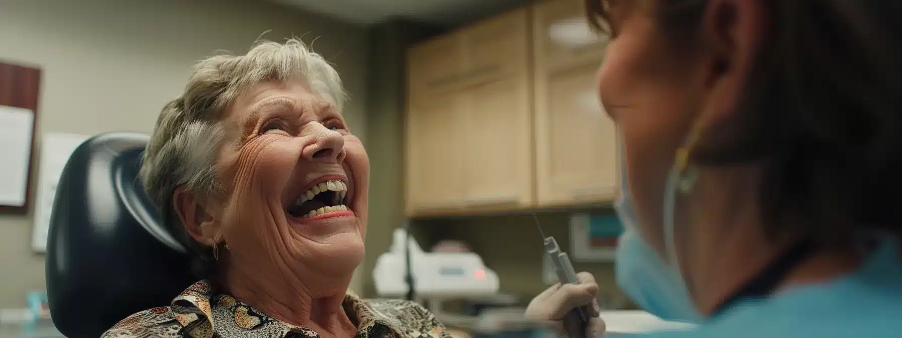 a smiling individual receiving quality, affordable dental care in tyler, texas, showcasing the positive impact of accessible dentures and implants on the community's well-being.