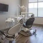 a smiling patient receiving high-quality dental care in a modern and affordable dental clinic in tyler, tx.