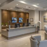 a bright, modern dental office showcases a confident patient smiling broadly, revealing a flawless set of all-on-4 dental implants.
