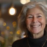 a radiant smile beams from a patient surrounded by soft, inviting lights in a modern dental clinic, showcasing the transformative effects of full mouth restoration.
