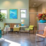 a bright and inviting dental clinic in fort worth showcases a smiling patient receiving a transformative dental implant, emphasizing the theme of accessible oral health improvement.