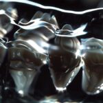 a dramatic close-up of a dental implant with a striking contrast between healthy and failing gum tissue, illuminated by soft, focused lighting to emphasize the intricacies of the surgical site in a modern dental office setting.