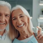 a serene, elderly couple smiles brightly, showcasing their natural-looking dental implants against a soft, sunlit background, emphasizing the theme of confidence in dental health.
