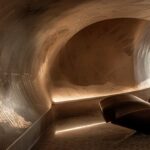 a stark, beautifully lit dental clinic interior, showcasing a gleaming extraction chair surrounded by vibrant, encouraging decor that highlights the theme of accessible dental care without insurance.
