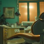 a striking close-up of a dentist's office, featuring a dental chair under soft, clinical lighting, symbolizing the emotional tension of a patient contemplating the aftermath of a tooth extraction.