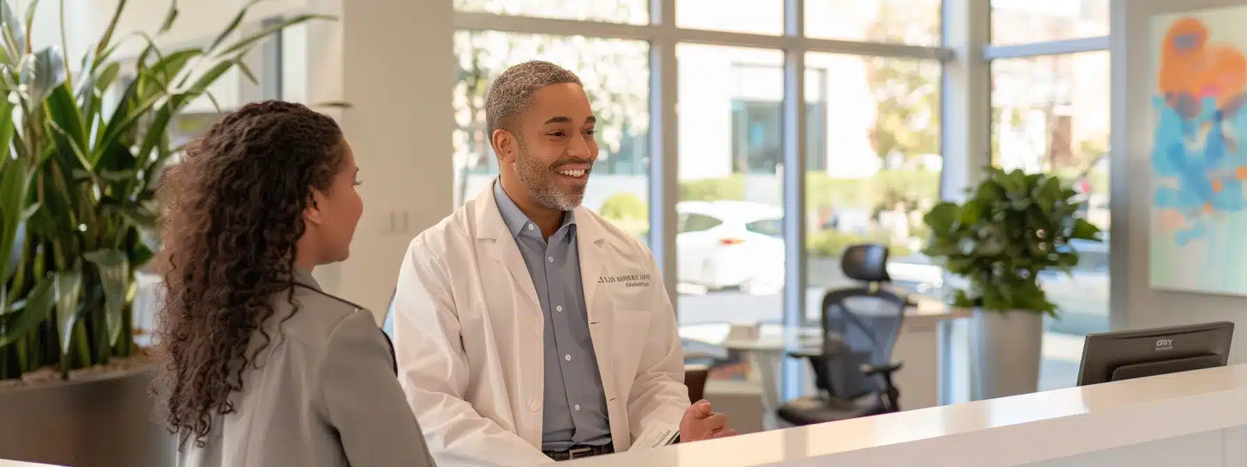 a bright, welcoming dental office with modern decor, showcasing a confident patient discussing financing options with a friendly dental consultant at a sleek reception desk.