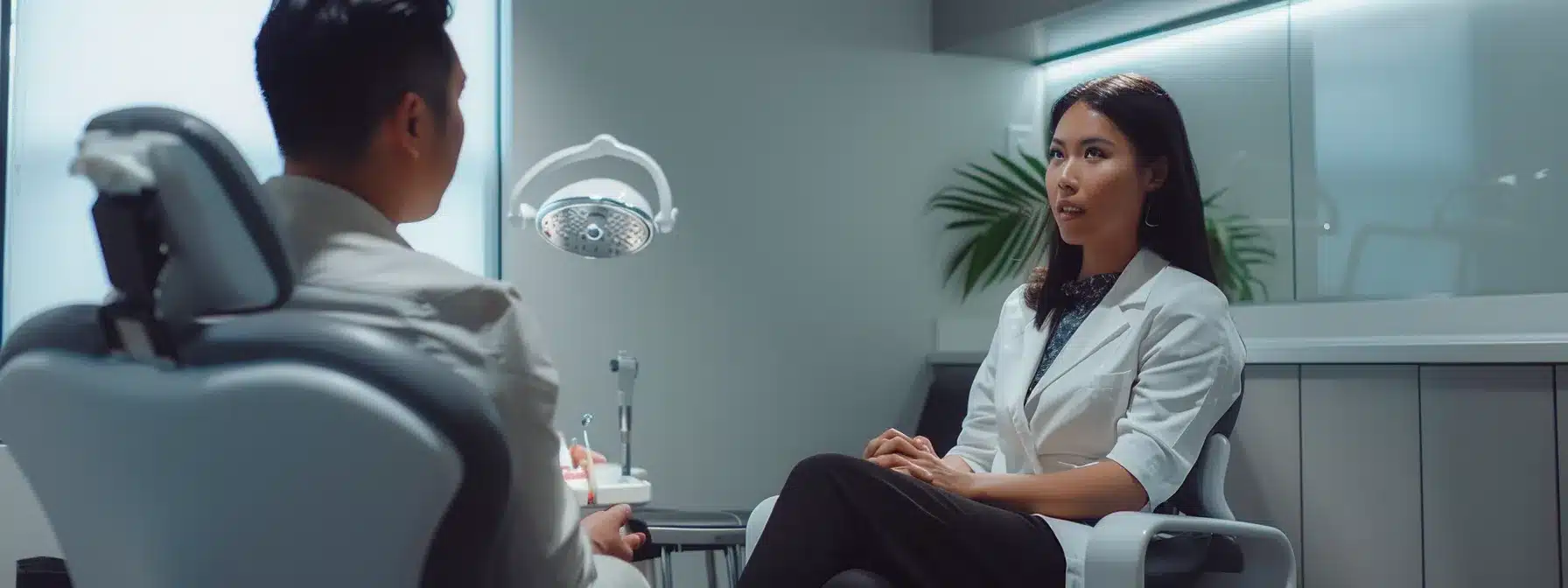 a confident patient engages in a thoughtful discussion with a knowledgeable implant surgeon in a modern, well-lit consultation room, symbolizing trust and clarity in the decision-making process.