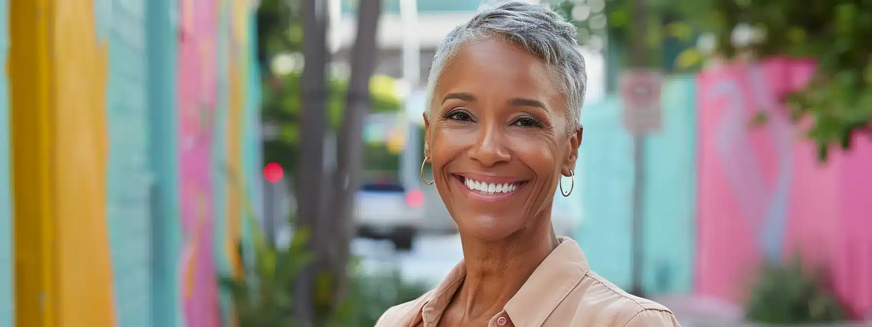 a radiant smile showcases expertly placed dental implants against the vibrant backdrop of los angeles, highlighting the transformative impact of modern dentistry on both appearance and confidence.