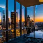 a dynamic urban office skyline at dusk, featuring sleek glass buildings illuminated by vibrant city lights, encapsulating the essence of corporate ambition and innovation.