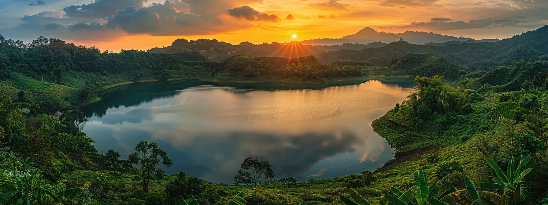 a vibrant sunset casts a warm golden glow over a tranquil lake, reflecting the fiery colors of the sky and surrounded by lush green hills, creating a serene and captivating atmosphere.