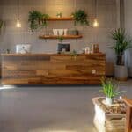 a modern urban office setting in cleburne, texas, showcasing a sleek reception area with an inviting desk and stylish decor, symbolizing accessibility and affordability in extraction services.