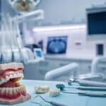 a sleek, modern dental clinic showcases a confident patient smiling with radiant dental implants, surrounded by advanced technology and clinical instruments, emphasizing the effectiveness and ease of dental implant procedures.