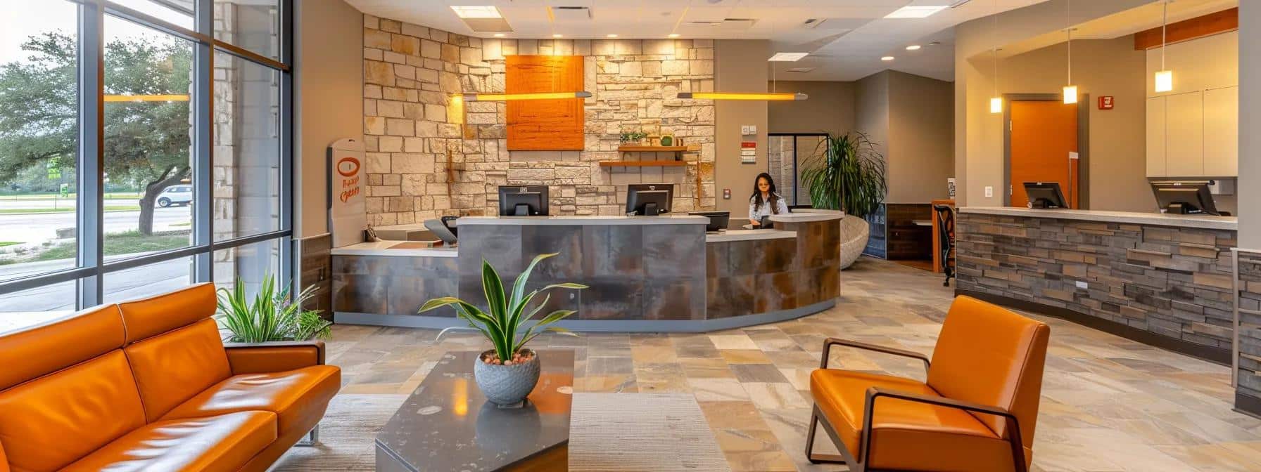 a bright, inviting dental office reception area features modern furnishings and friendly staff welcoming patients, embodying a sense of comfort and professionalism in granbury family dental.