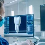 a sleek, modern dental clinic interior showcases a focused dental professional expertly examining a high-resolution 3d imaging scan of a dental implant, highlighting the precision and advanced technology involved in the successful integration of implants into patient care.