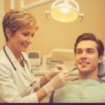 Dental consultation about implant recovery in a welcoming clinic environment