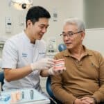 Dental consultation about implants in a welcoming clinic setting