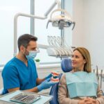 Dental implant procedure in a modern clinic with dentist and patient interaction