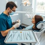 Dental clinic scene with dentist preparing for tooth extraction, conveying professionalism and care