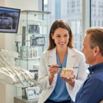 Dental consultation about mini dental implants in a modern office