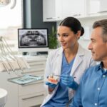 Dental consultation about mini and traditional dental implants