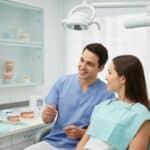 Dental consultation on implants and bridges in a modern dental office