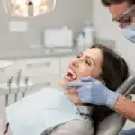 Check for any visible movement of the implant crown when you press on it gently