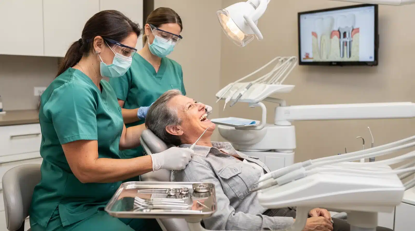 Visiting your dentist regularly helps identify early signs of dental implant failure.; Affordable Dentist Near