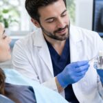 How much does a single dental implant cost without insurance in 2026?